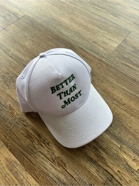 White Baseball Cap with Green "Better Than Most" Embroidery